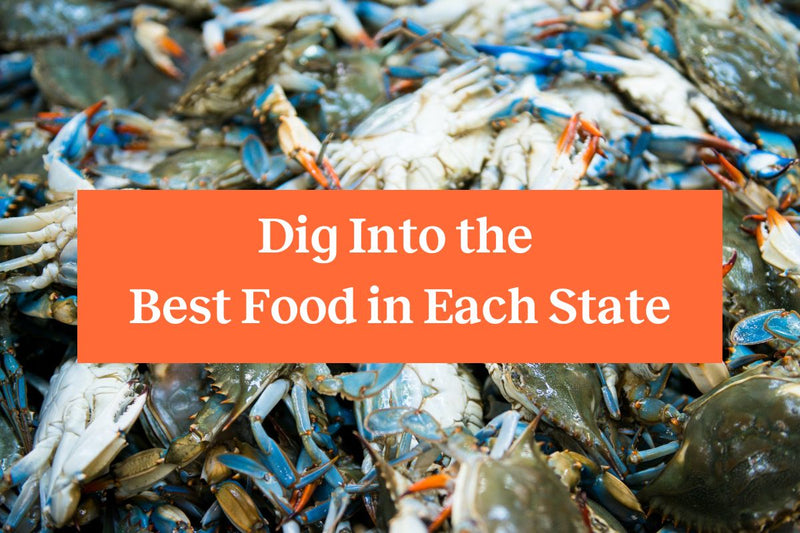 Several Maryland blue crabs in the background with an orange rectangle and white letters that read 