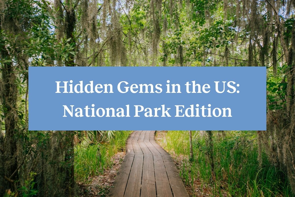 A boardwalk through swampland at Jean Lafitte National Historical Park and Preserve and the words "hidden gems in the US: national park edition"