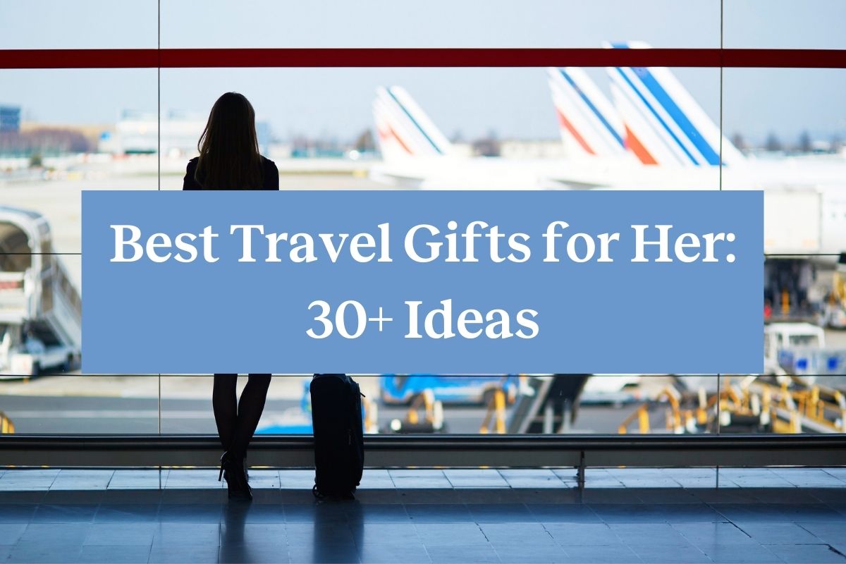 A woman standing with her luggage in an airport looking at planes and a blue rectangle with the words "Best Travel Gifts for Her: 30+ Ideas"