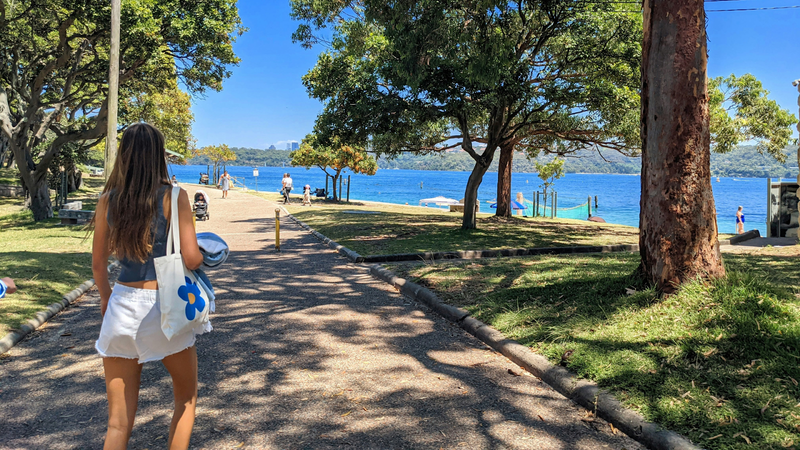 Woman Walking Along Shark Beach, Australia Waterfront