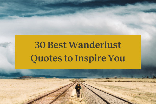 A person walking in an open valley with crazy weather and a yellow rectangle with the words "30 best wanderlust quotes to inspire you"